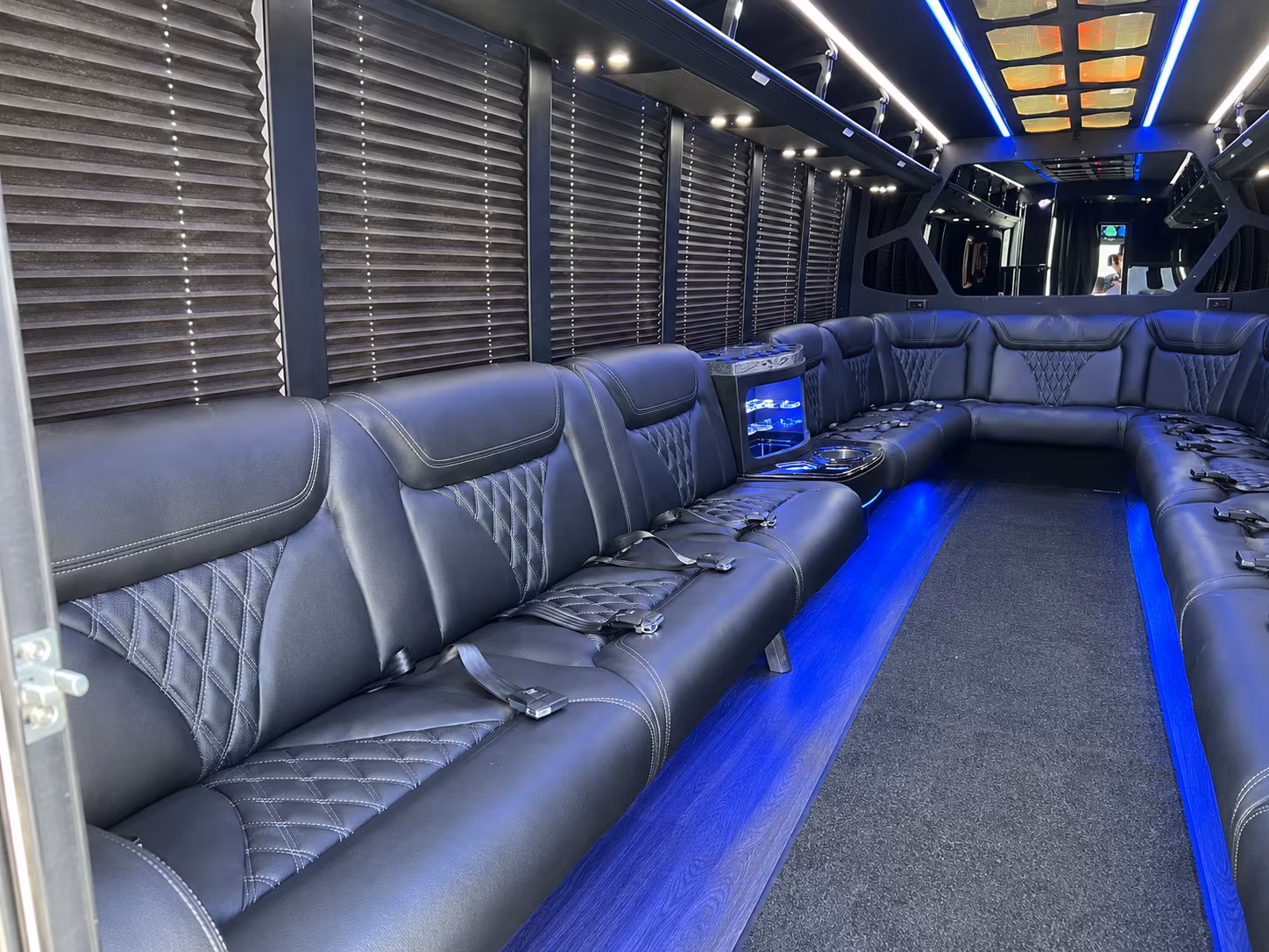 Passenger seating aboard a party bus rental serving Fontana